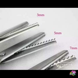 Cây kéo răng cưa 